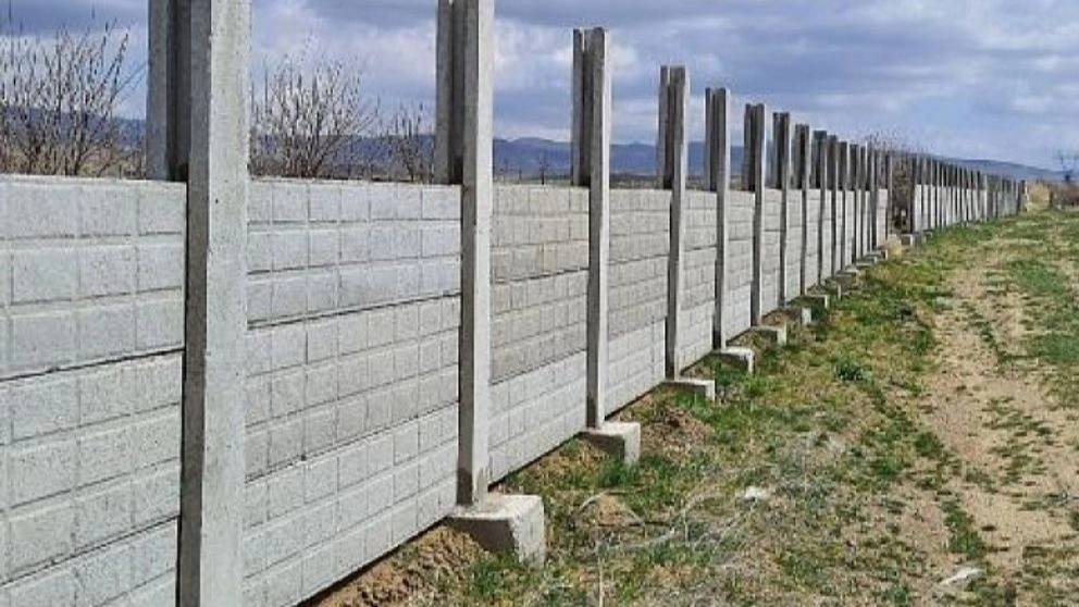 Concrete fence base